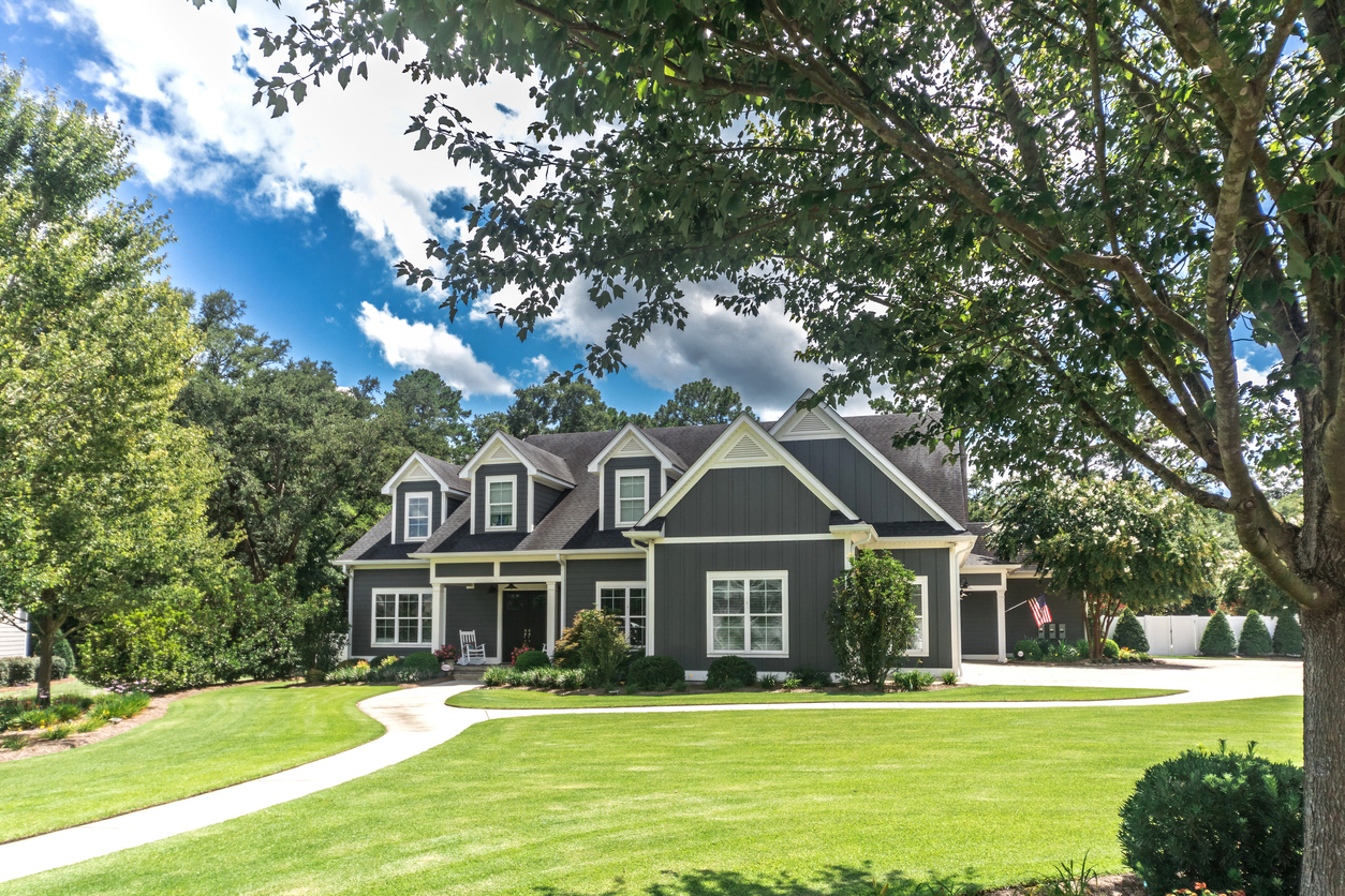 Large craftsman-style custom home on a landscaped lot
