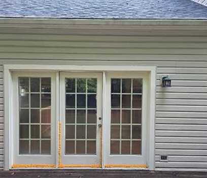 Original patio french doors before Virginia Exteriors window conversion